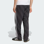 FIREBIRD LOOSE MONOGRAM TRACK PANTS